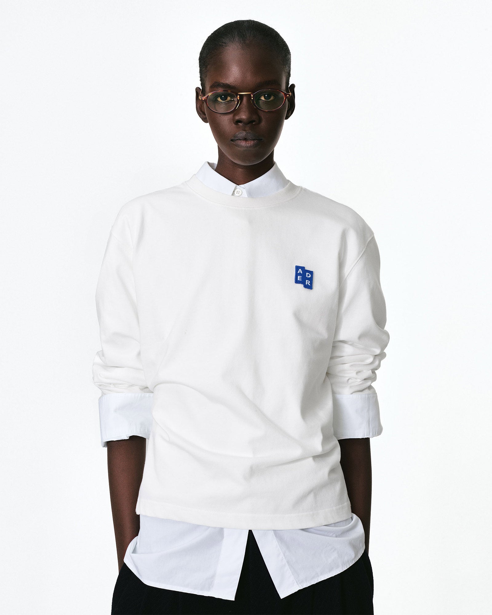 Ader Error・アーダーエラー - L/S Tシャツ BL TAG LS T-SHIRT / OFF WHITE