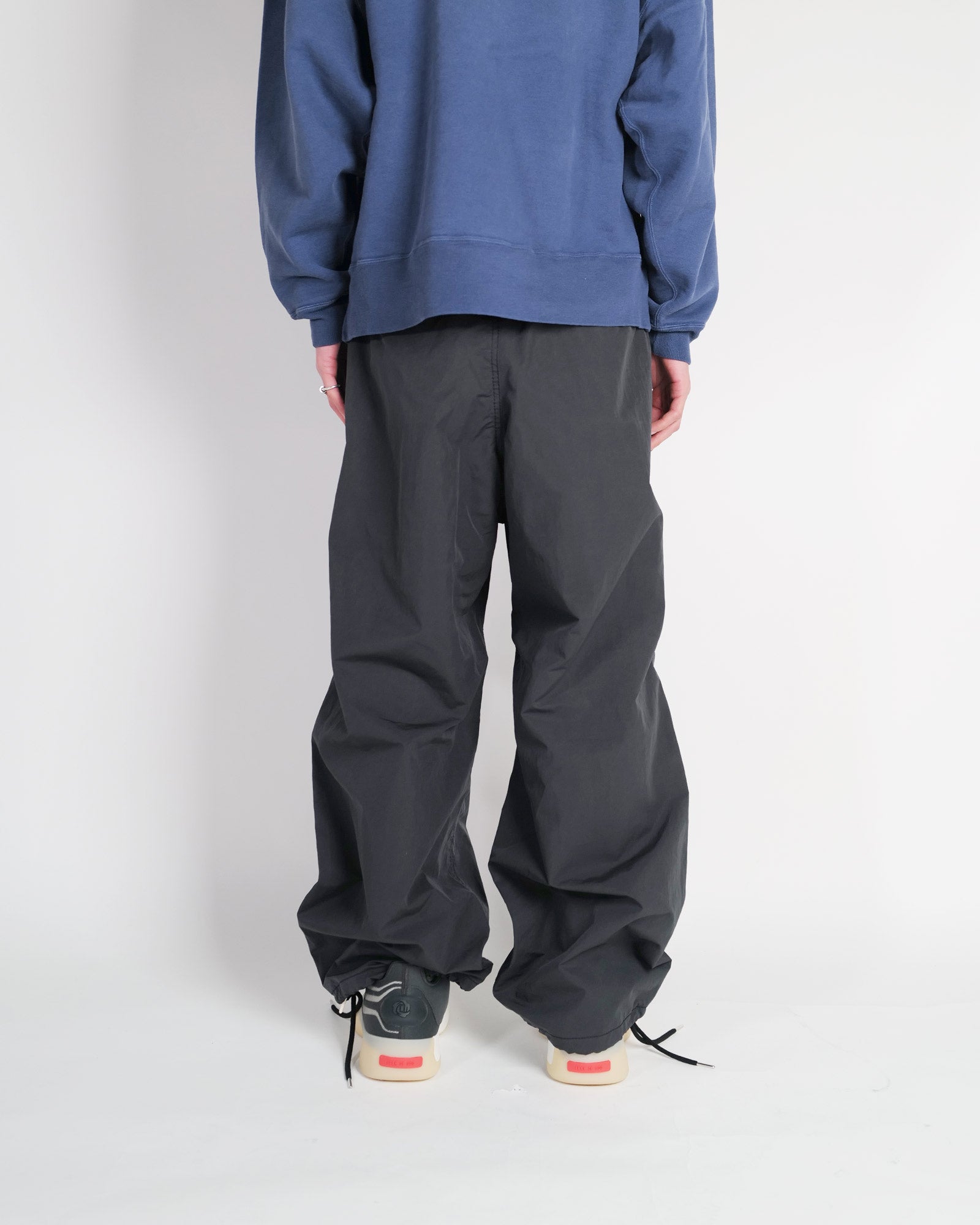 PHENIX・フェニックス -  REWORKED SNOW CAMO CARGO PANTS / BLACK