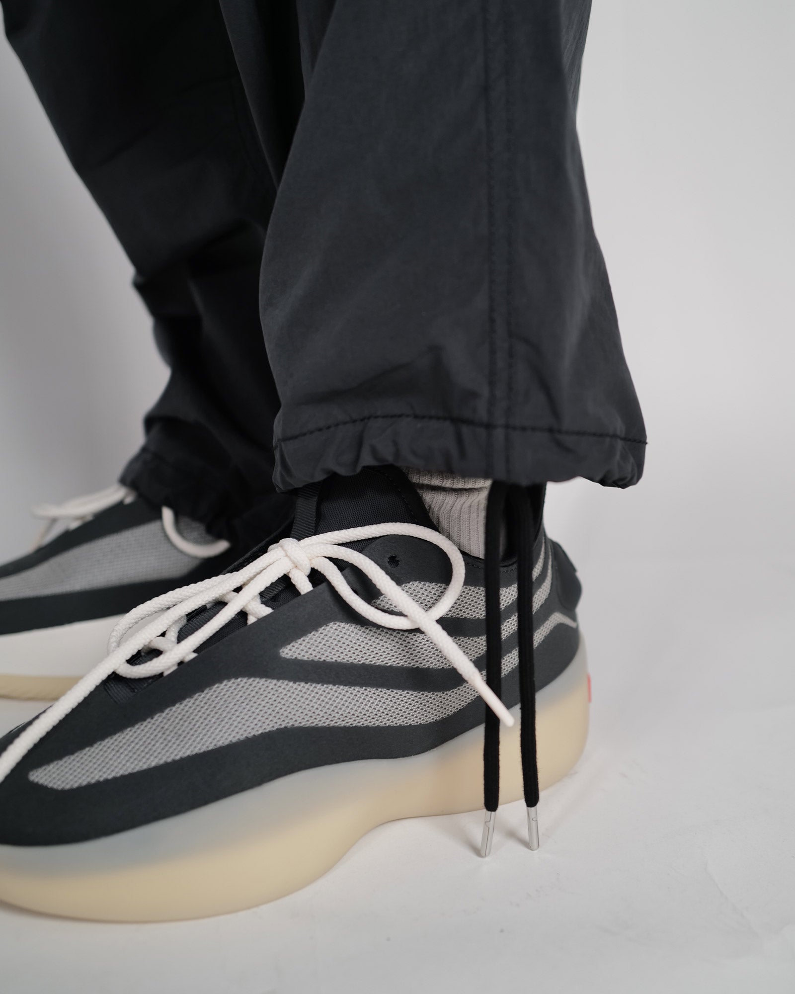 PHENIX・フェニックス -  REWORKED SNOW CAMO CARGO PANTS / BLACK