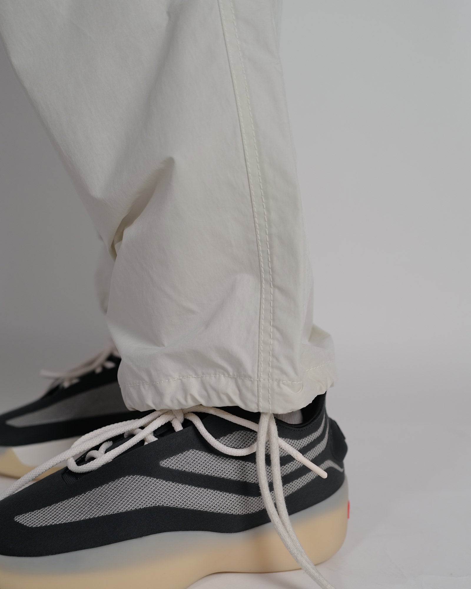 PHENIX・フェニックス -  REWORKED SNOW CAMO CARGO PANTS / WHITE