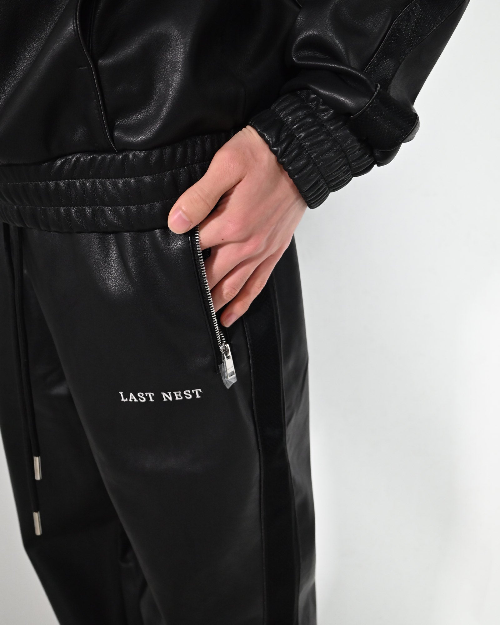 LAST NEST・ラストネスト - ジャージ・トラックパンツ FAUX LEATHER TRACK PANTS / BLACK